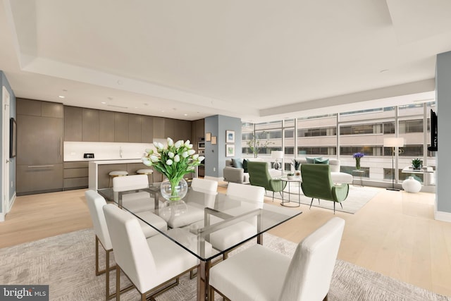 dining room featuring light wood-style floors
