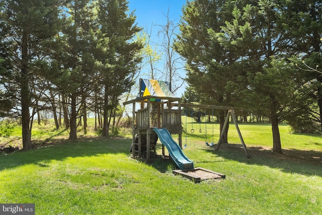view of playground featuring a lawn