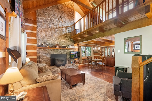 living room with high vaulted ceiling, wooden ceiling, wood finished floors, and beam ceiling