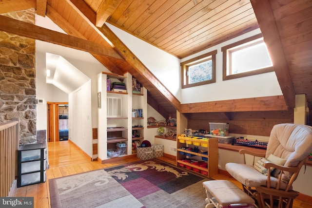 sitting room featuring lofted ceiling with beams, wooden ceiling, and hardwood / wood-style flooring