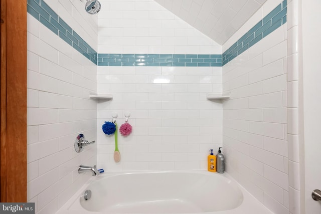 bathroom featuring washtub / shower combination