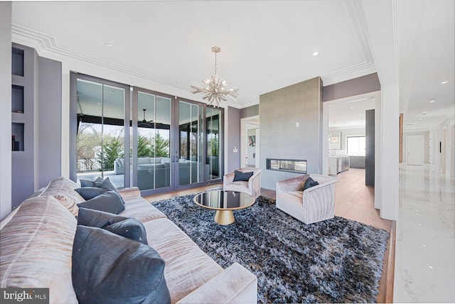 1109 Towlston Rd, Mclean, VA 22102 - living room with recessed lighting, ornamental molding, and a notable chandelier