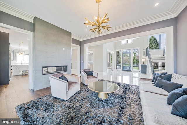 1109 Towlston Rd, Mclean, VA 22102 - living room with an inviting chandelier, ornamental molding, a wealth of natural light, and a large fireplace
