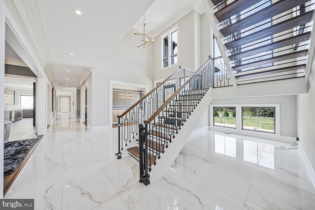 1109 Towlston Rd, Mclean, VA 22102 - stairs with baseboards, a chandelier, and marble finish floor