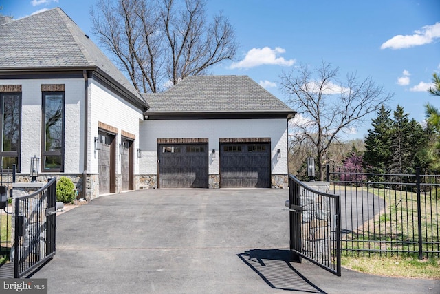 1109 Towlston Rd, Mclean, VA 22102 - view of side of home featuring brick siding, fence, driveway, and stone siding