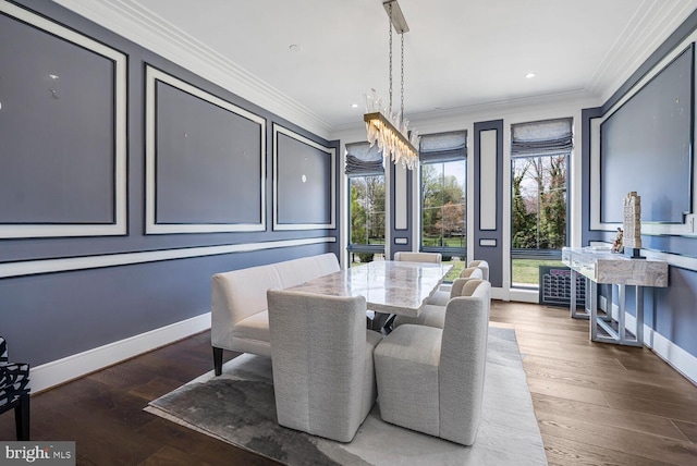 1109 Towlston Rd, Mclean, VA 22102 - dining room with crown molding, baseboards, and wood finished floors