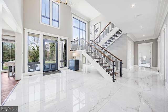 1109 Towlston Rd, Mclean, VA 22102 - entrance foyer featuring stairs, a high ceiling, a wealth of natural light, and marble finish floor