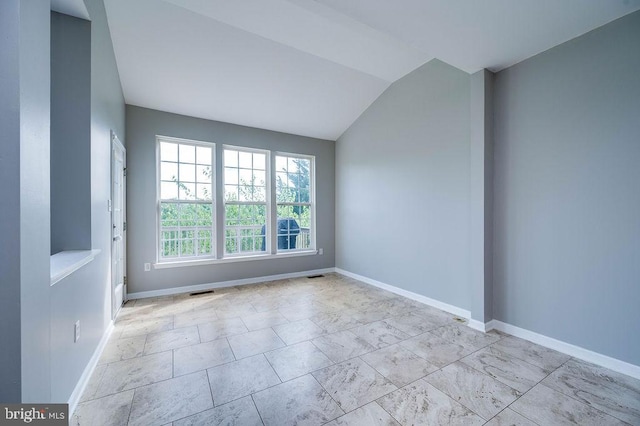 62 Brookview Ln, Pottstown, PA 19464 - empty room featuring lofted ceiling and baseboards