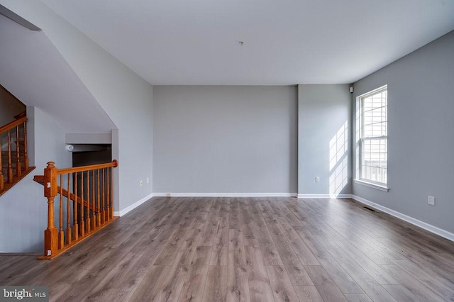 62 Brookview Ln, Pottstown, PA 19464 - unfurnished living room with wood finished floors and baseboards