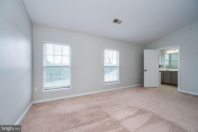 62 Brookview Ln, Pottstown, PA 19464 - unfurnished room featuring light colored carpet and lofted ceiling