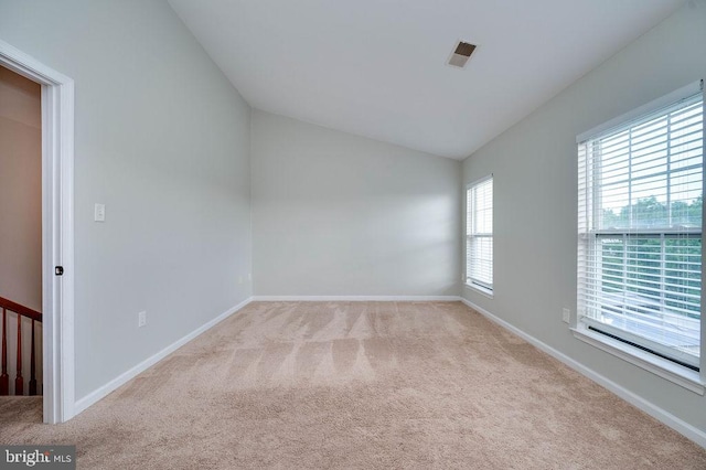 62 Brookview Ln, Pottstown, PA 19464 - empty room with lofted ceiling and carpet