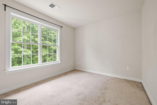 18547 Kerill Rd, Triangle, VA 22172 - carpeted empty room with plenty of natural light and baseboards