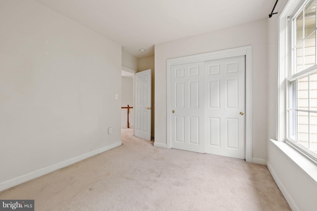 18547 Kerill Rd, Triangle, VA 22172 - unfurnished bedroom featuring carpet flooring, baseboards, and a closet