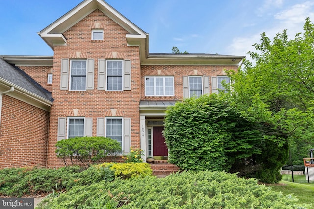 18547 Kerill Rd, Triangle, VA 22172 - view of front of property with brick siding and fence