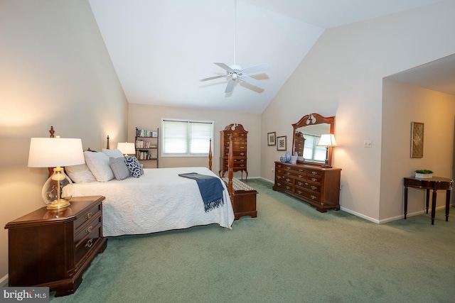 carpeted bedroom with high vaulted ceiling, ceiling fan, and baseboards