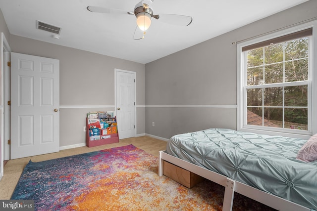 63 Woodleigh Ln, Stafford, VA 22556 - carpeted bedroom with baseboards, visible vents, and a ceiling fan