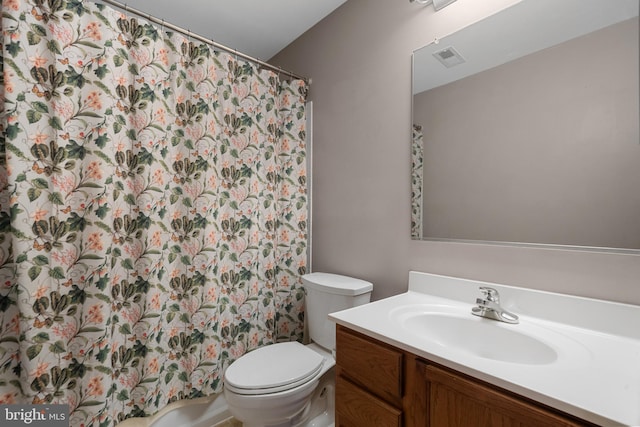 63 Woodleigh Ln, Stafford, VA 22556 - full bath with visible vents, toilet, vanity, and a shower with curtain