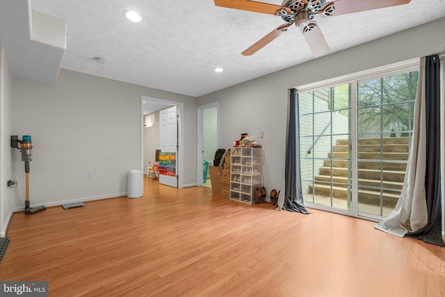 63 Woodleigh Ln, Stafford, VA 22556 - interior space with a textured ceiling, light wood-style flooring, baseboards, ceiling fan, and recessed lighting