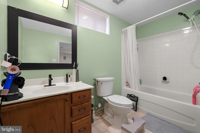 63 Woodleigh Ln, Stafford, VA 22556 - full bath featuring tile patterned flooring, shower / bathtub combination with curtain, vanity, toilet, and visible vents