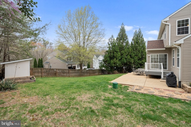 63 Woodleigh Ln, Stafford, VA 22556 - view of yard with a storage shed, an outbuilding, fence, and a patio