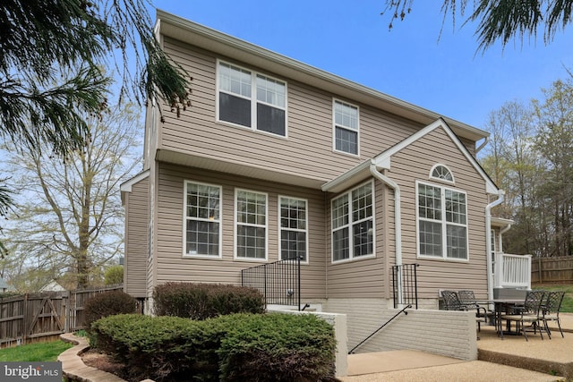 63 Woodleigh Ln, Stafford, VA 22556 - back of property with a patio and fence