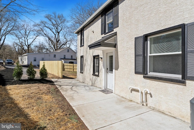 636 Ridge Pike, Lafayette Hill, PA 19444 - view of side of home with stucco siding and a patio area