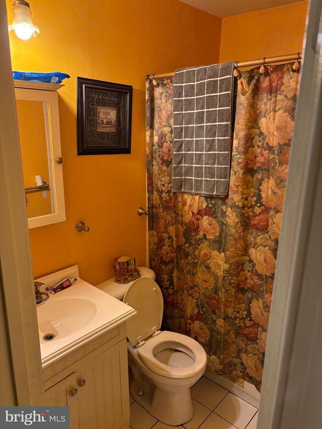 13 Gentry Ln, Capitol Heights, MD 20743 - bathroom featuring tile patterned flooring, vanity, toilet, and curtained shower