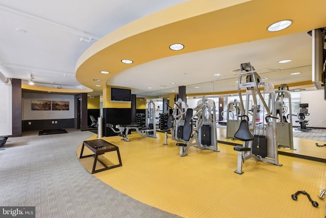 workout area with recessed lighting
