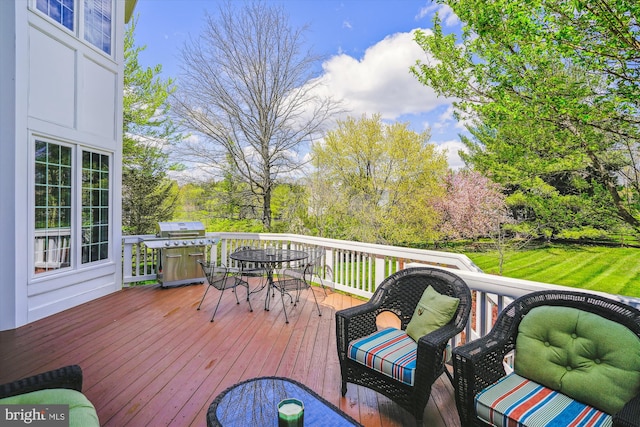 deck with outdoor dining space