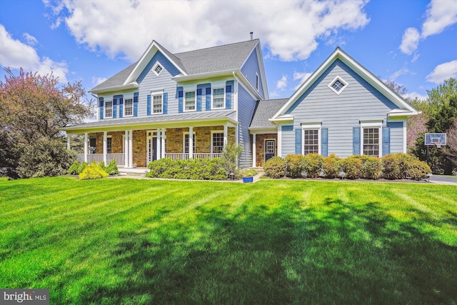 colonial-style house with a front lawn and covered porch