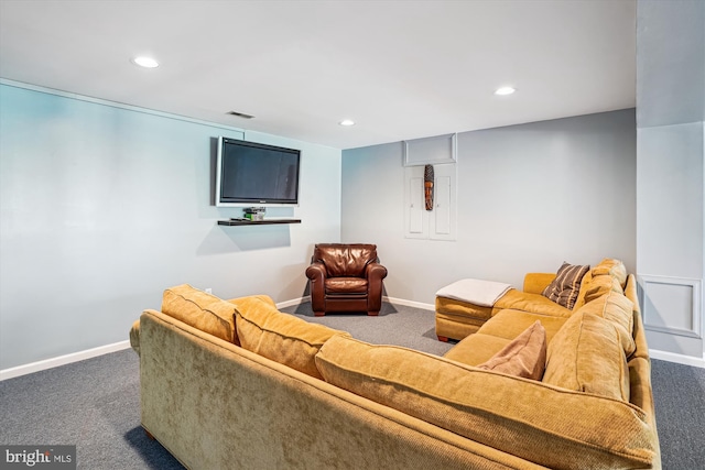 carpeted living area with baseboards, visible vents, and recessed lighting