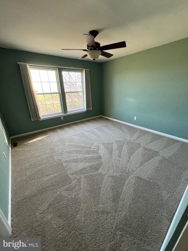 122 Lahinch Ct, Middletown, DE 19709 - spare room with baseboards, a ceiling fan, and carpet