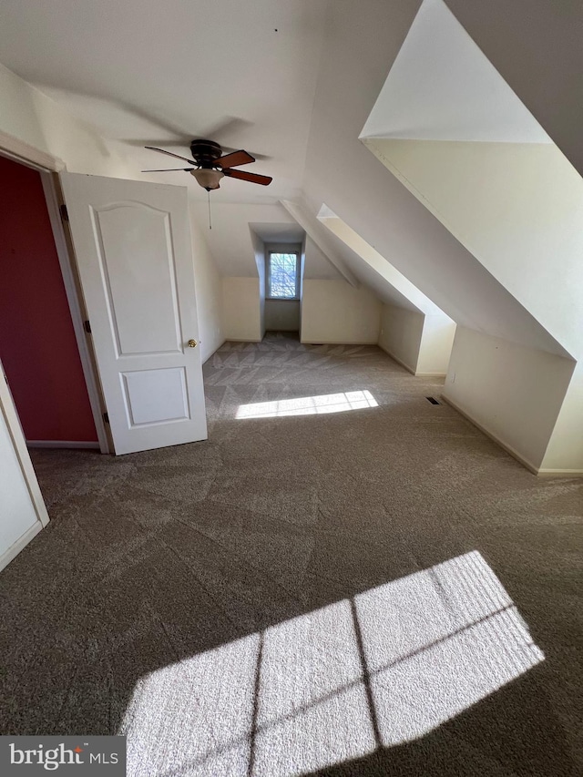 122 Lahinch Ct, Middletown, DE 19709 - additional living space with vaulted ceiling, ceiling fan, and carpet flooring