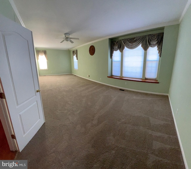 122 Lahinch Ct, Middletown, DE 19709 - empty room with ornamental molding, carpet, baseboards, visible vents, and a ceiling fan