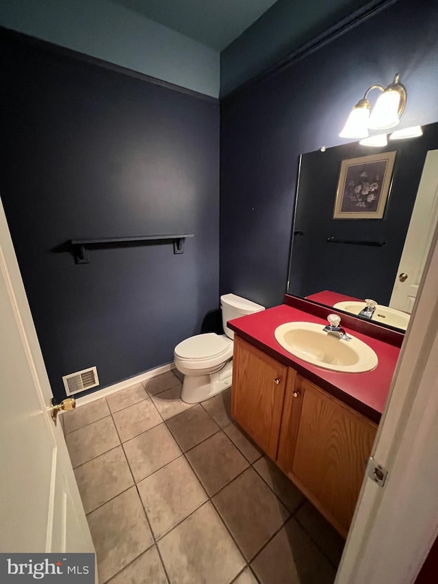 122 Lahinch Ct, Middletown, DE 19709 - half bath featuring tile patterned floors, vanity, toilet, and visible vents