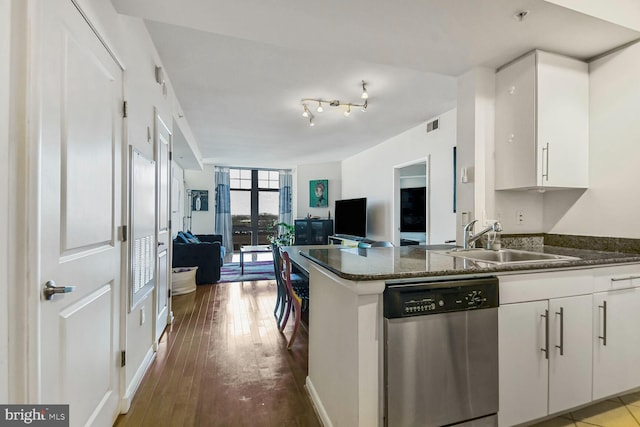1021 N Garfield St Unit 831, Arlington, VA 22201 - kitchen with floor to ceiling windows, a sink, wood-type flooring, stainless steel dishwasher, and open floor plan