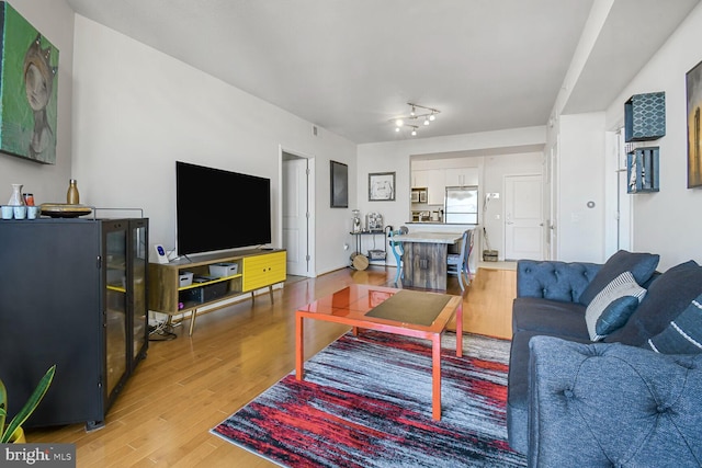 1021 N Garfield St Unit 831, Arlington, VA 22201 - living room featuring light wood-type flooring