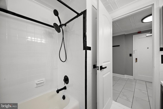 full bathroom featuring baseboards, marble finish floor, and bathtub / shower combination