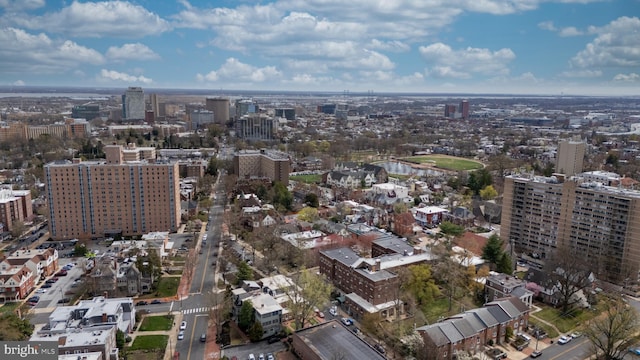 birds eye view of property with a view of city