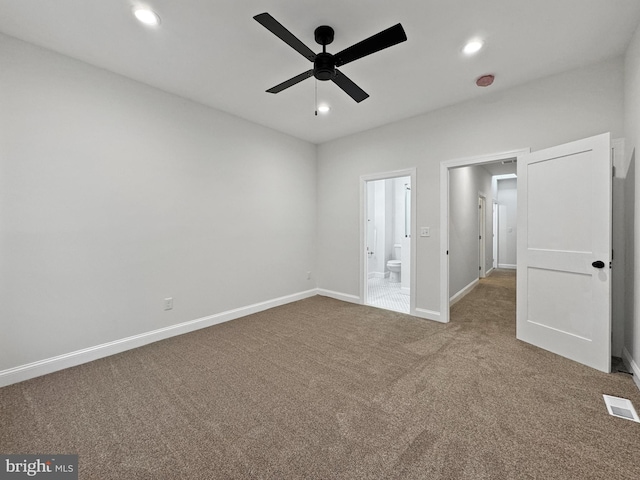 unfurnished bedroom featuring baseboards, carpet, visible vents, and recessed lighting
