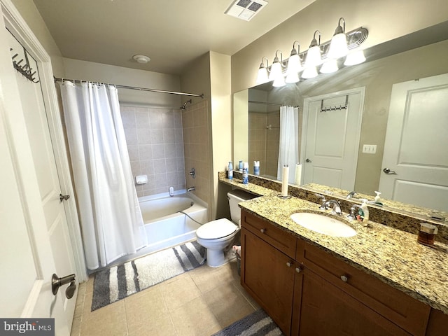 full bath featuring toilet, vanity, shower / tub combo with curtain, visible vents, and tile patterned flooring
