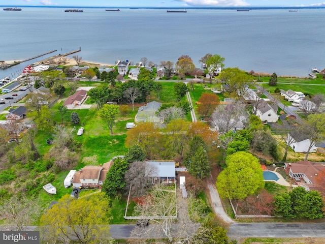 bird's eye view with a residential view and a water view