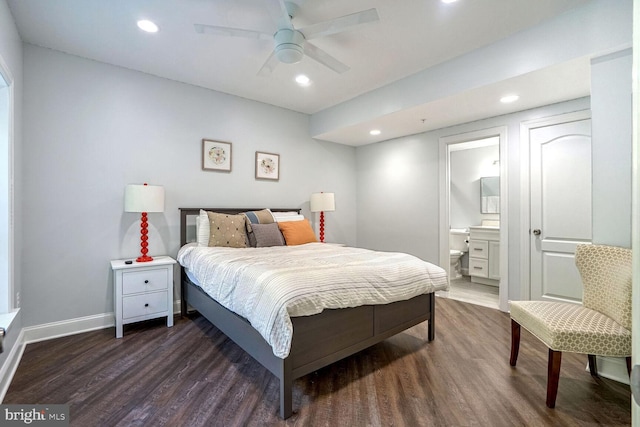 bedroom featuring baseboards, ensuite bath, recessed lighting, and dark wood-style flooring