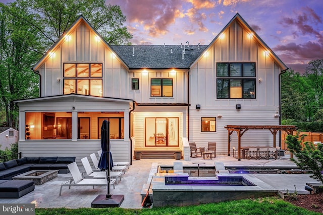 1544 Forest Villa Ln, Mclean, VA 22101 - back of house featuring board and batten siding, an outdoor living space with a fire pit, a patio, and a pergola