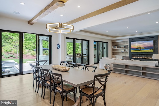 1544 Forest Villa Ln, Mclean, VA 22101 - dining room with light wood-style flooring, beamed ceiling, a glass covered fireplace, and recessed lighting