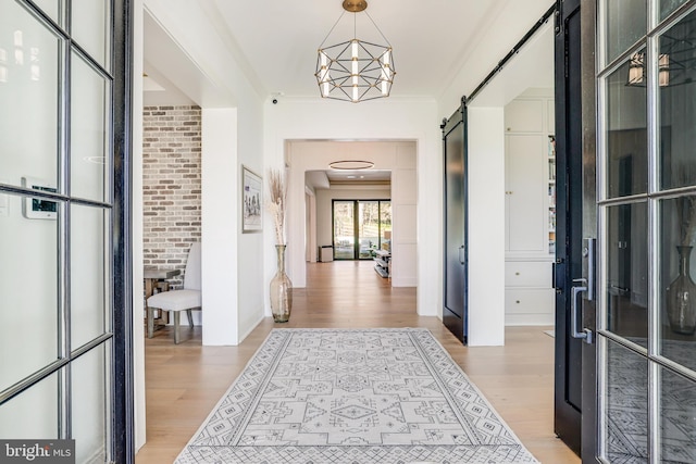 1544 Forest Villa Ln, Mclean, VA 22101 - foyer entrance featuring light wood-style flooring and a barn door