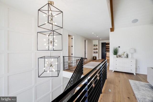1544 Forest Villa Ln, Mclean, VA 22101 - corridor with a chandelier, beamed ceiling, wood finished floors, baseboards, and recessed lighting
