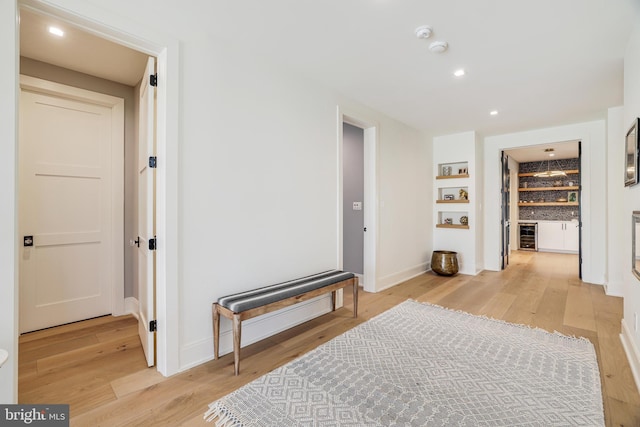 1544 Forest Villa Ln, Mclean, VA 22101 - hallway featuring light wood-style floors, wine cooler, recessed lighting, and baseboards