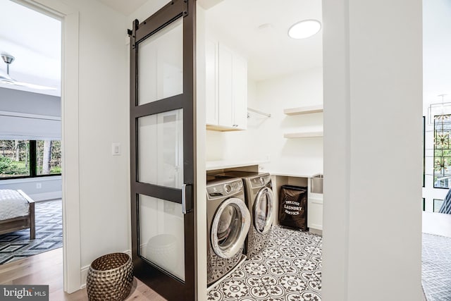 1544 Forest Villa Ln, Mclean, VA 22101 - washroom featuring cabinet space, plenty of natural light, washer and dryer, and a barn door