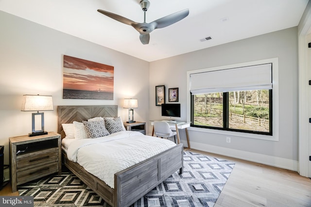 1544 Forest Villa Ln, Mclean, VA 22101 - bedroom with wood finished floors, baseboards, and a ceiling fan
